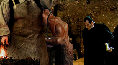 &quot;Are you ready to confess, wench?&quot; the Inqusitor addressed Rebecca. His stern voice echoed through the fetid chamber as he repeated the question and added a threat. &quot;Are you ready to confess? Or should I order the hot irons?&quot; The GIMP is from SubSpaceland.