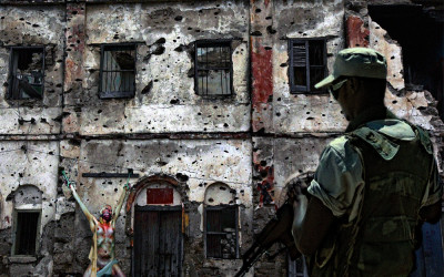 Abused and ravished all night, Carry was about to be shot. A foreign devil in the wrong place at the wrong time.